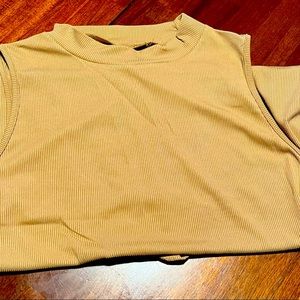 Ribbed, mock neck bodysuit - never worn. Lovely layering piece for fall!